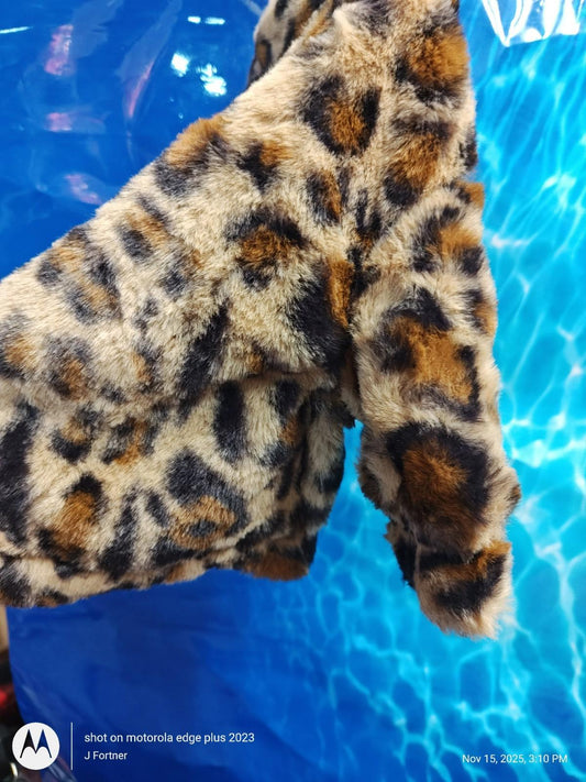 Leopard Print Faux Fur Jacket featuring a soft texture and stylish design.