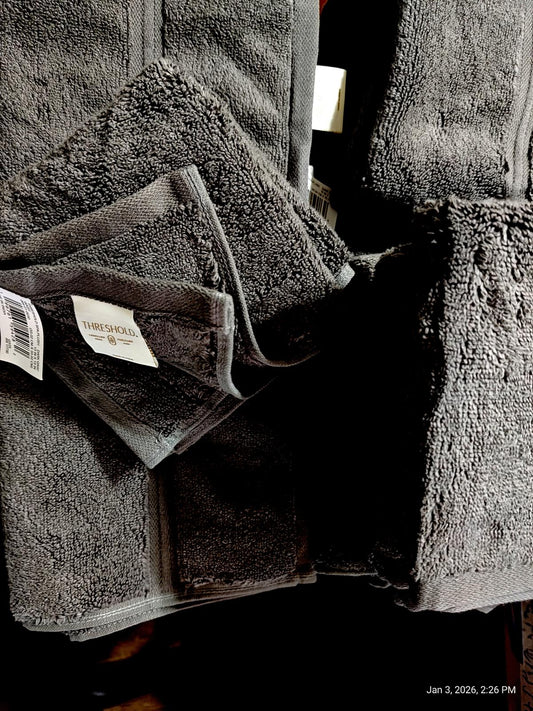 Charcoal Bath Towels set featuring soft, absorbent fabric and various sizes.