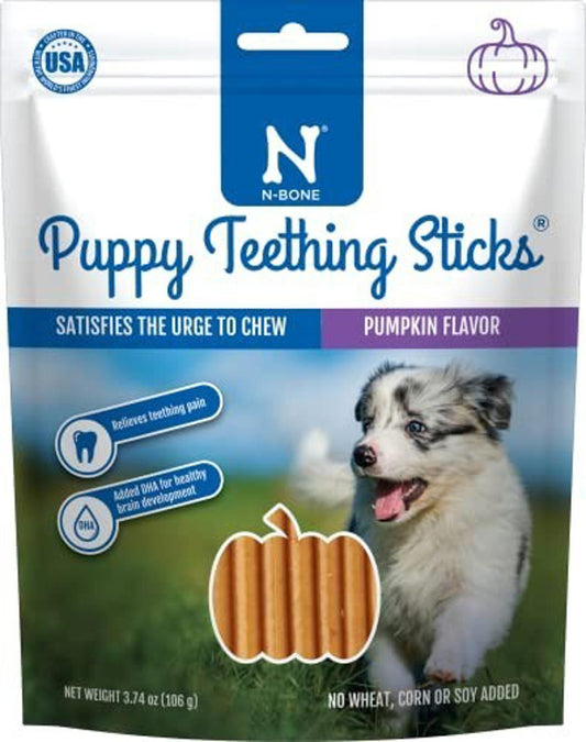 N-Bone Puppy Teething Sticks in pumpkin flavor, ideal for teething puppies, with a playful puppy on the packaging.