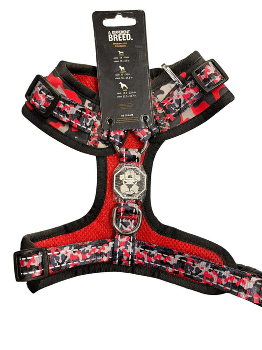 Breed dog harness in red and black camouflage design with adjustable straps.