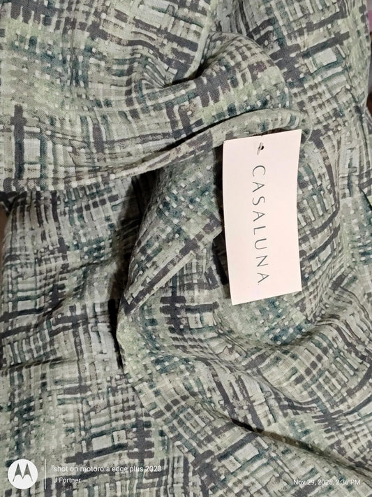 Casaluna patterned fabric featuring a textured design in shades of green and gray.