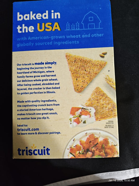 Triscuit baked in the USA box featuring whole grain crackers and serving suggestions.