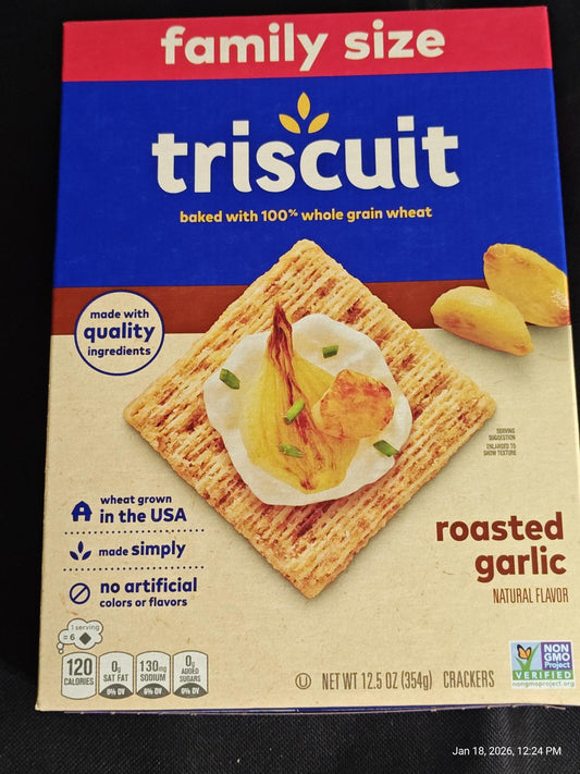 Triscuit roasted garlic family size crackers with a golden color and natural flavor.
