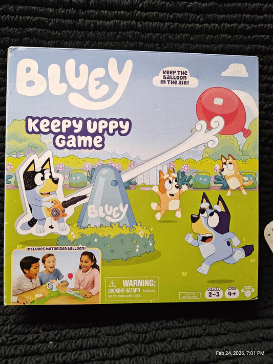 Bluey Keepy Uppy Game featuring colorful characters and balloon-catching action.
