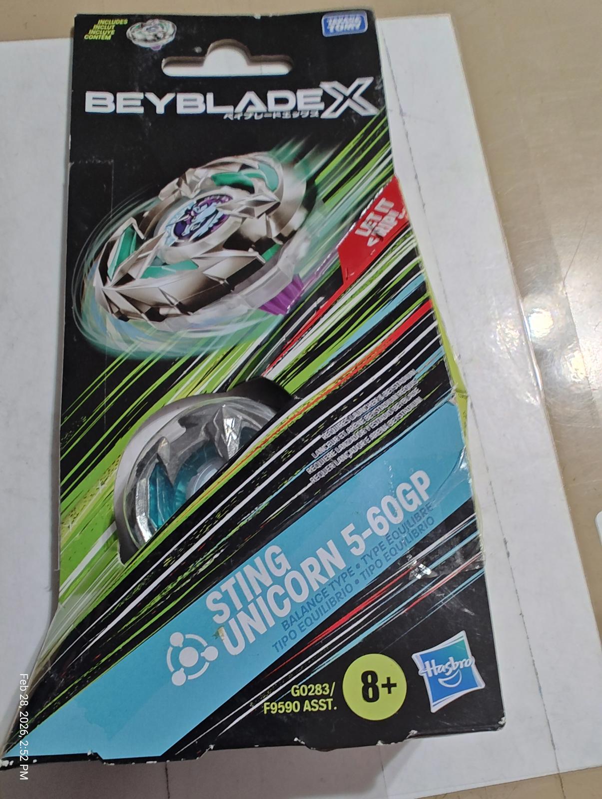 Beyblade X Sting Unicorn 5-60GP packaging featuring vibrant colors and spinning top design.