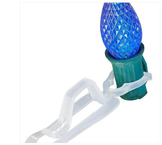 Christmas Light Clip for securing blue decorative bulbs in place.