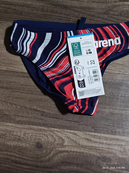 Arena swim briefs featuring a vibrant striped design in red and navy colors.