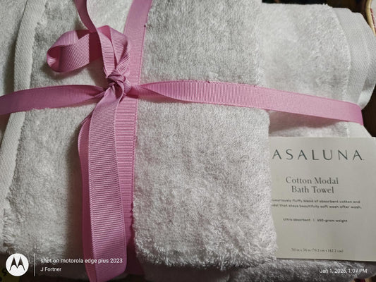 ASALUNA cotton modal bath towel set wrapped with a pink ribbon, showcasing soft white towels.
