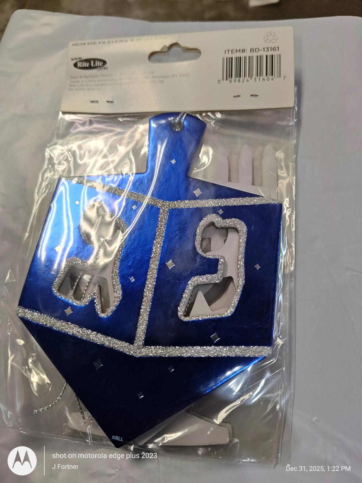Blue Dreidel ornament with glittery details, perfect for Hanukkah celebrations.