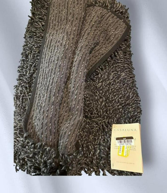 Calluna bath mat set featuring a soft, textured gray design with a plush finish.