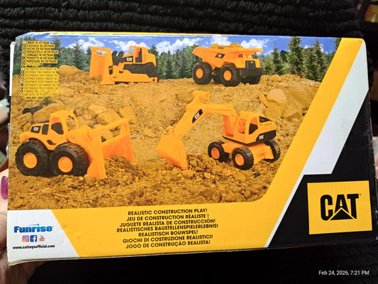 CAT construction vehicle set featuring realistic toy trucks and excavators in bright orange color.