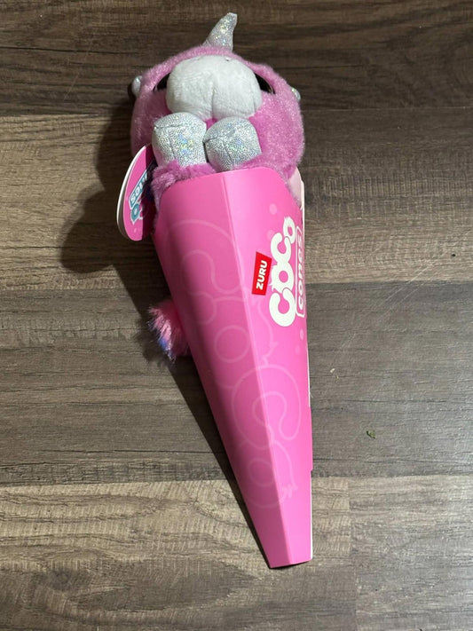 Coco Unicorn plush toy in a pink ice cream cone packaging, featuring sparkly details.
