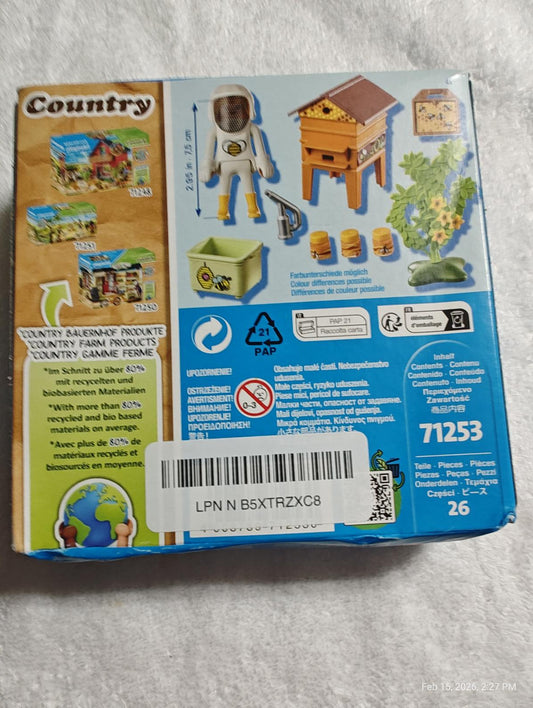 Country Building Playset featuring a farmer, barn, and accessories for imaginative play.