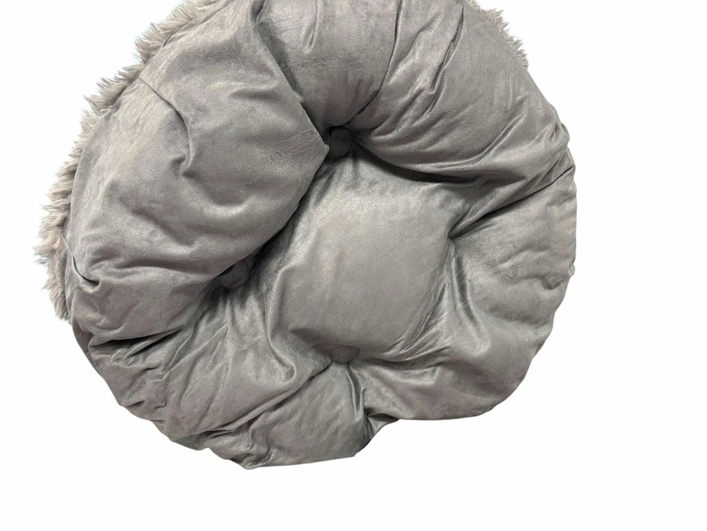 Cozy round pet bed in soft gray fabric, perfect for small dogs and cats.