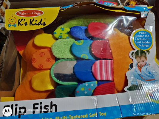 Flip Fish soft toy featuring colorful, multi-textured fins for sensory play.