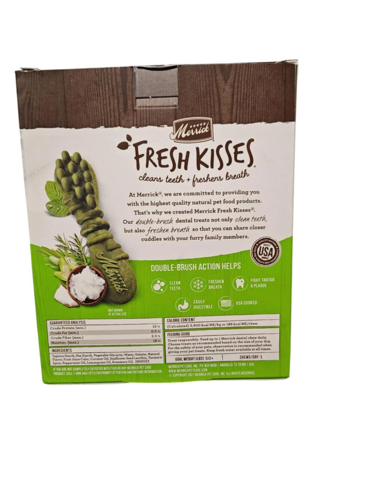 Fresh Kisses dog toothbrush featuring a green design with coconut scent for effective cleaning.