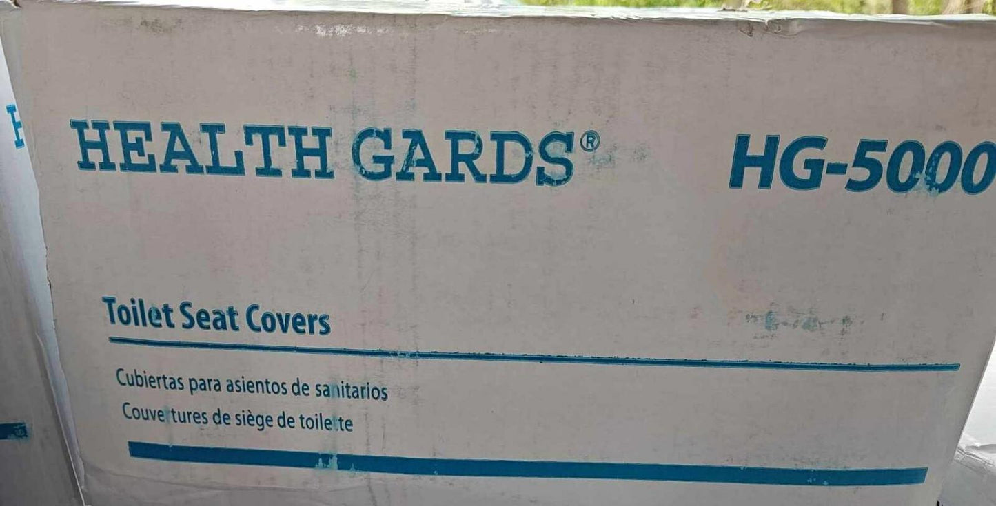 Health Guards HG-5000 toilet seat covers in a box, designed for hygiene and convenience.