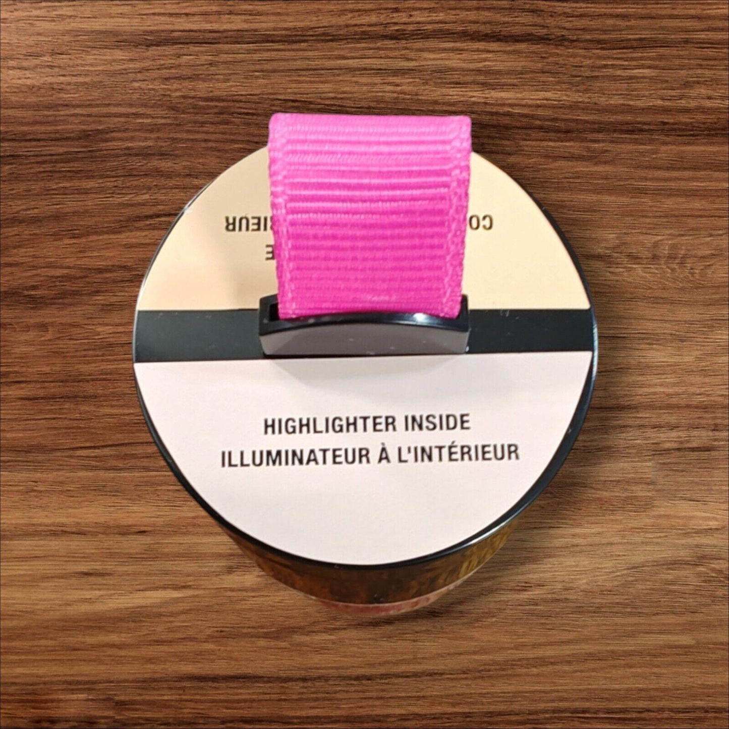 Highlighter inside with a vibrant pink cap for easy access and visibility.