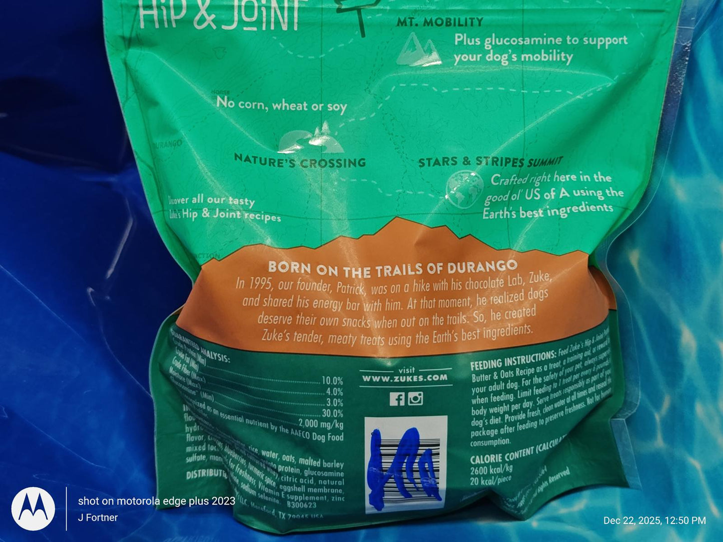 Hip & Joint supplement for dogs, featuring natural ingredients and a green packaging design.