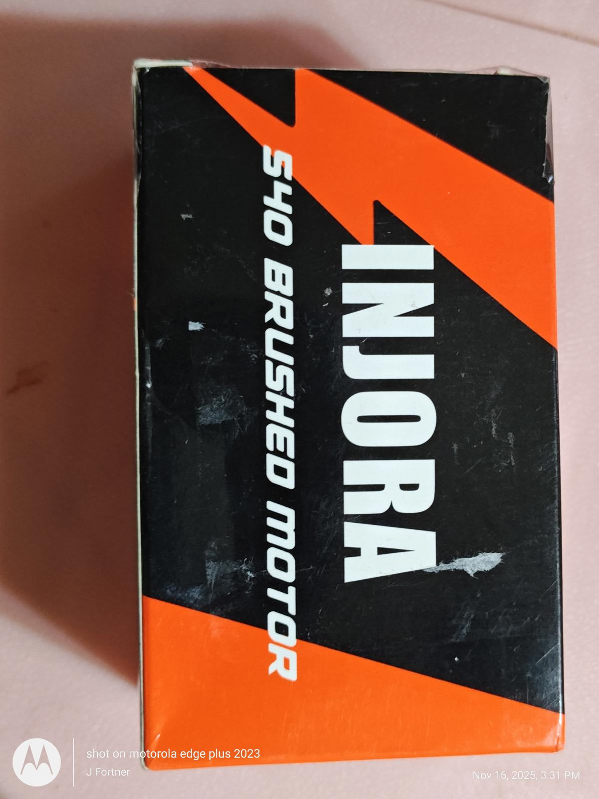 INJORA S540 brushed motor box featuring a bold orange and black design.
