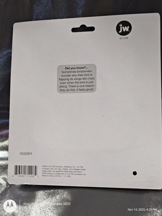 JW Pet Company back of the packaging with informative text and logo.