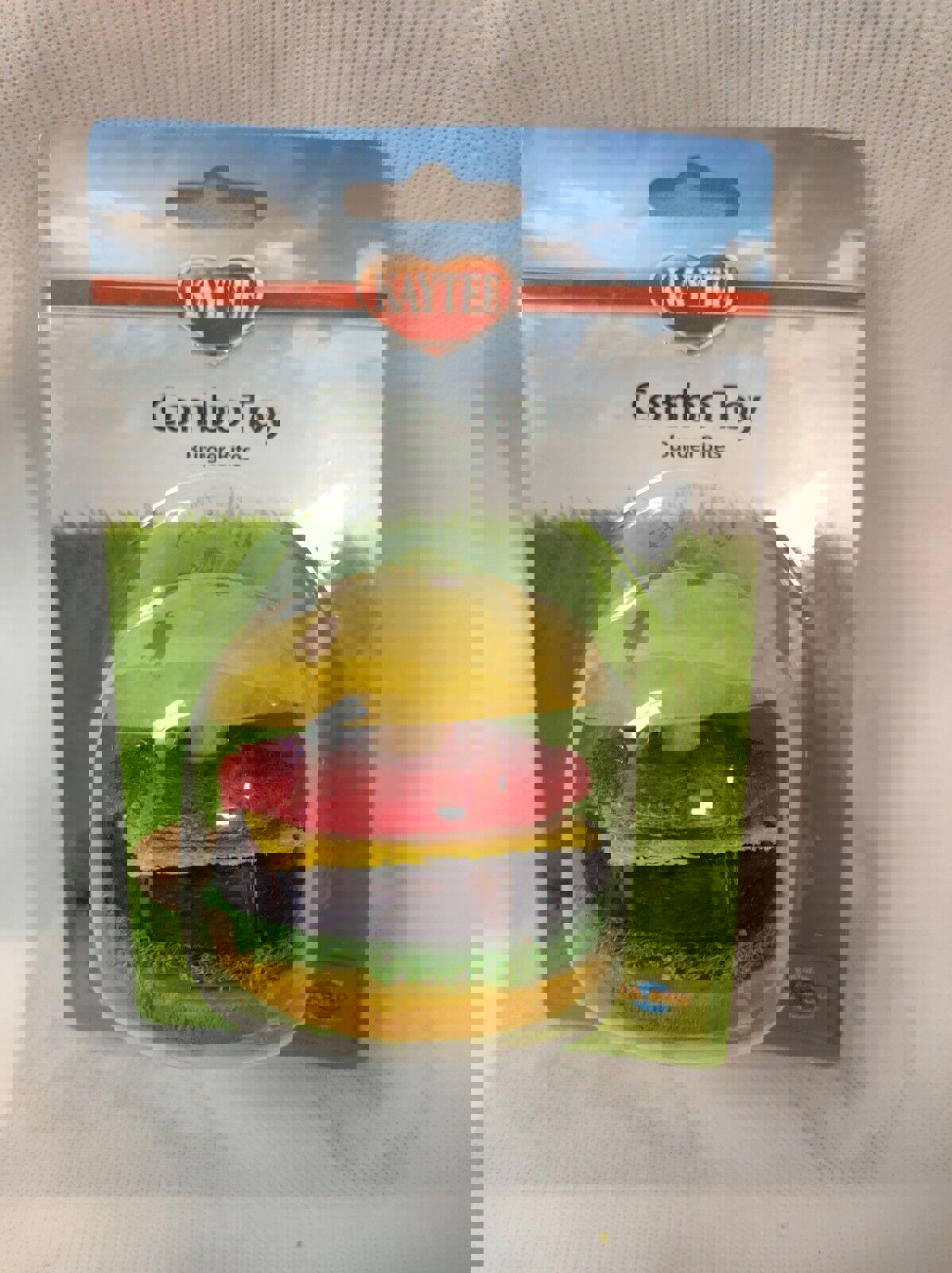 Kaytee Combo Toy features a colorful burger design with layers of yellow, red, and purple materials.