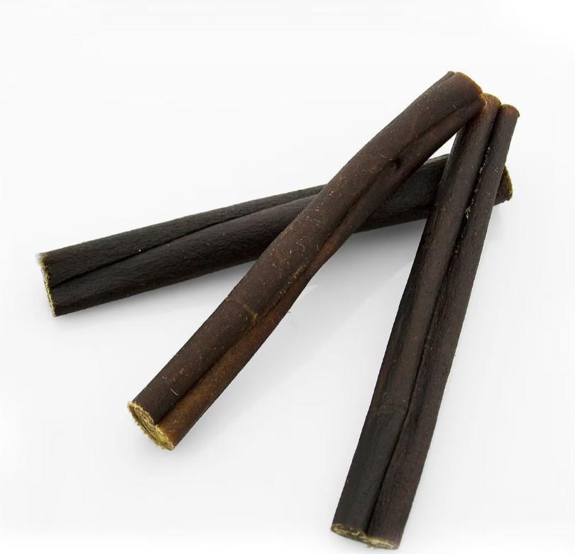Licorice root sticks, dark brown and elongated, perfect for herbal remedies.