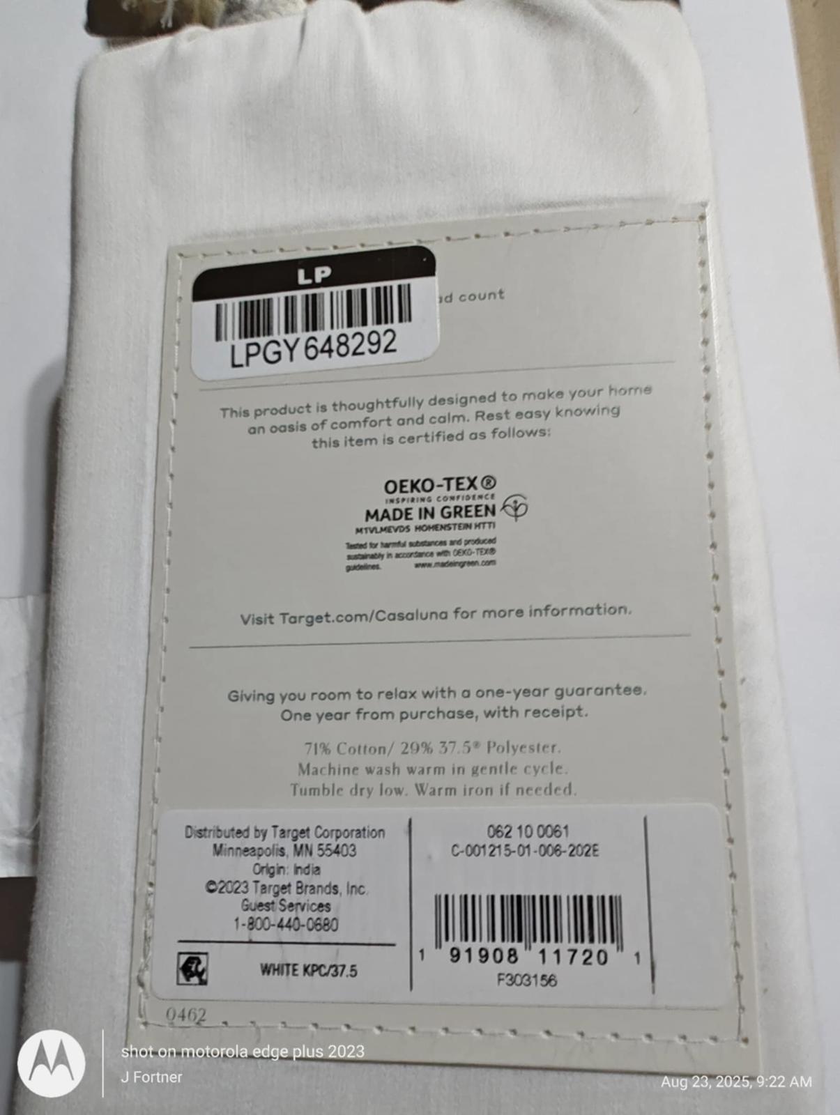 LPGY 648292 product tag showing care instructions and Oeko-Tex certification.