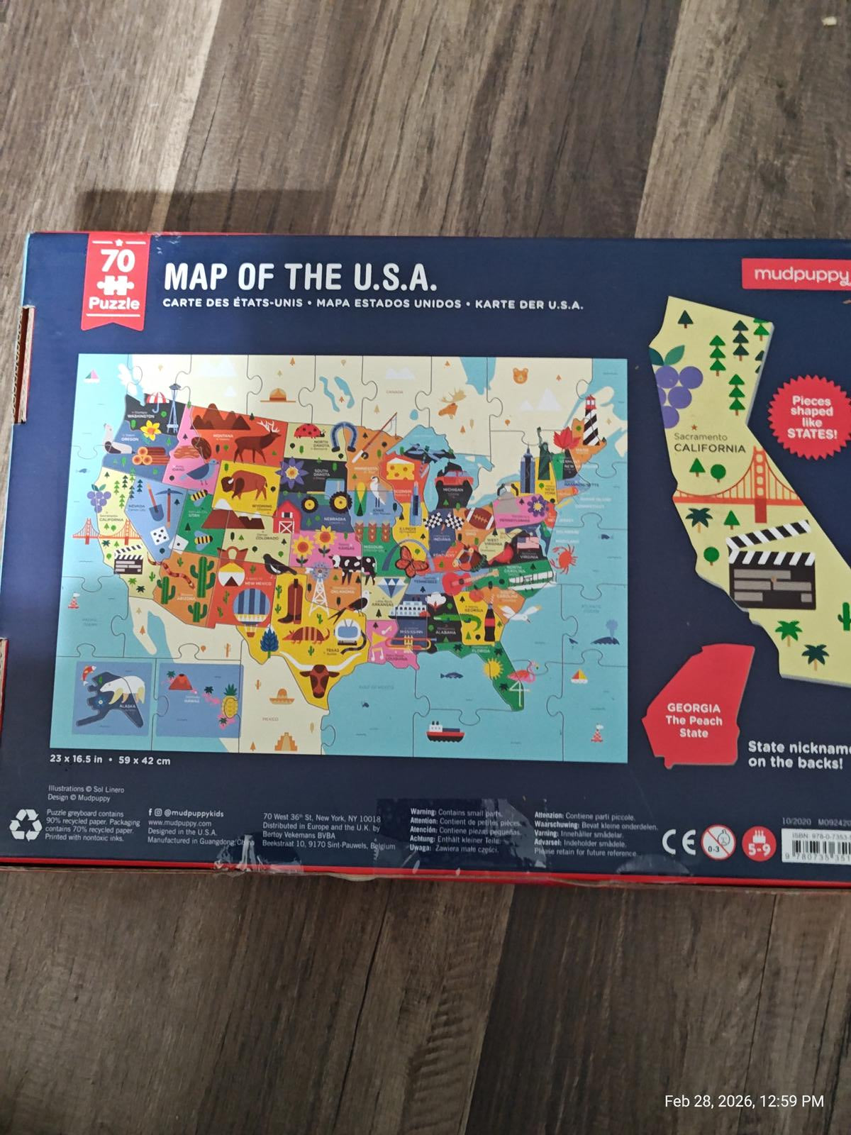 Map of the U.S.A. puzzle featuring colorful illustrations of states and landmarks.