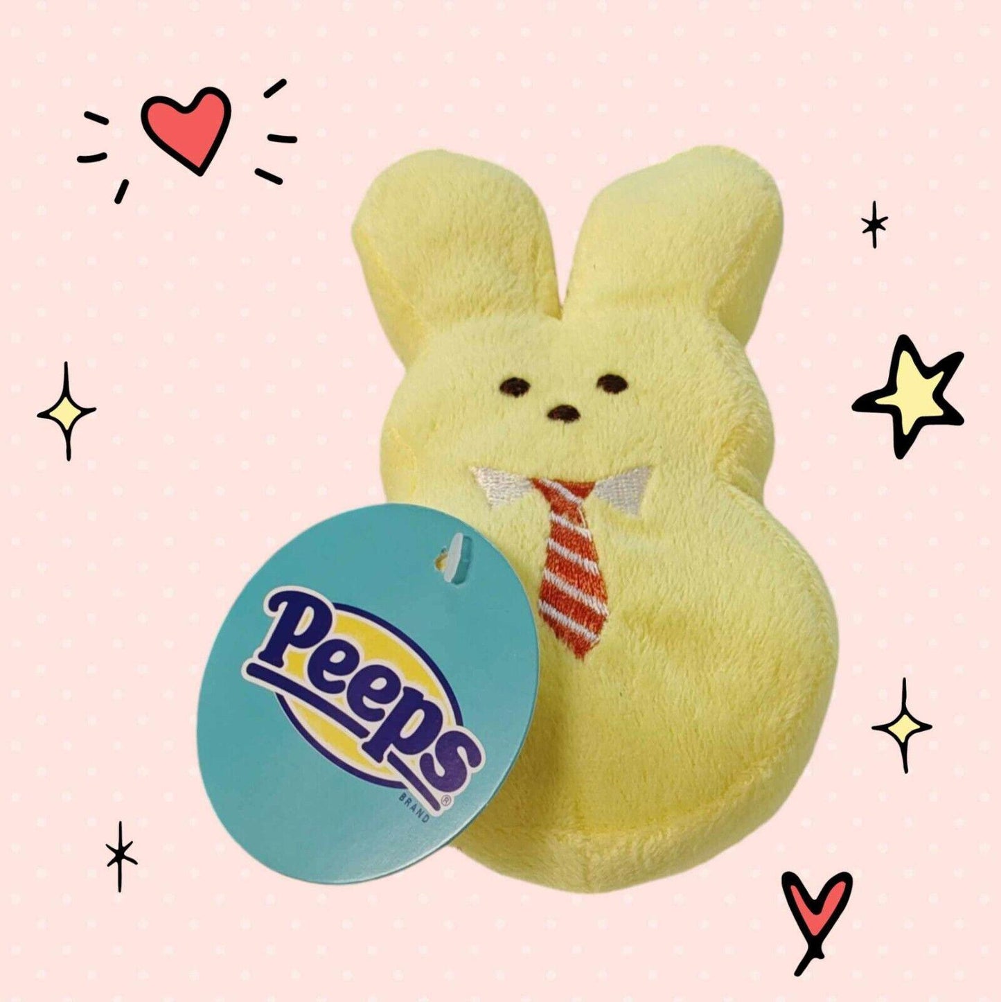 Peeps plush bunny in yellow with a red tie, perfect for Easter celebrations.