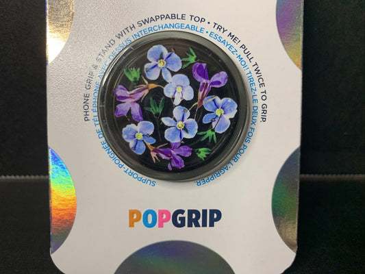 PopGrip with floral design featuring purple flowers and a swappable top for phone grip.