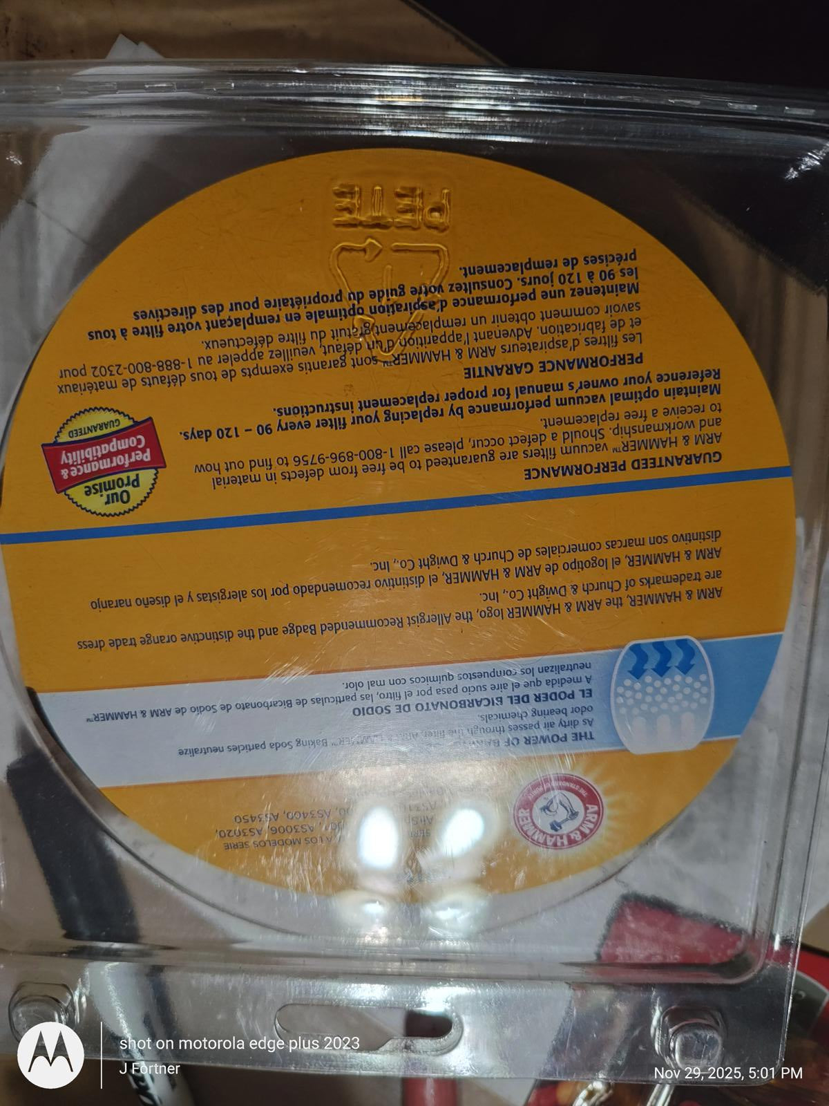 Product name prominently displayed on the round packaging, featuring bright colors and clear labeling.