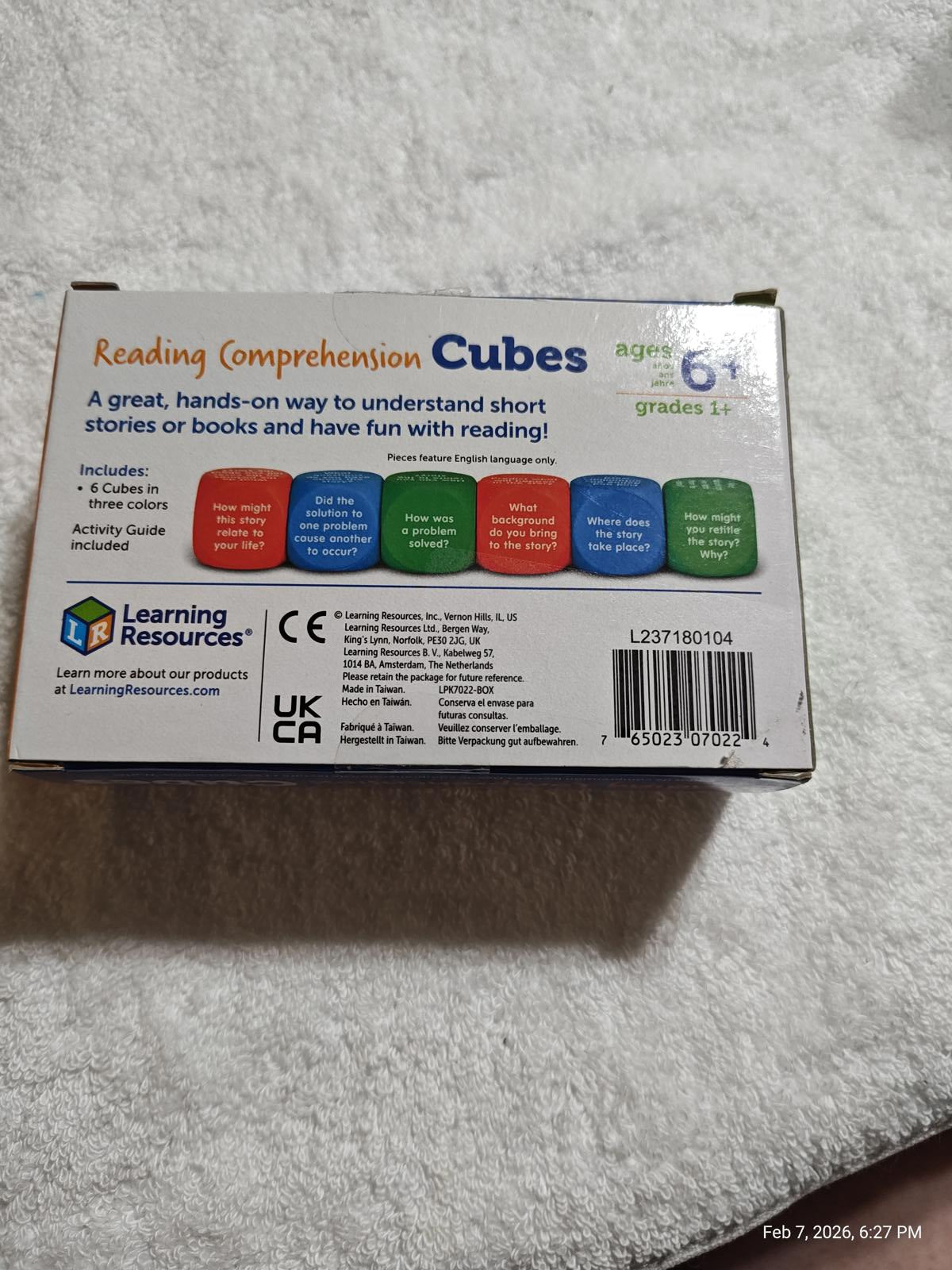 Reading Comprehension Cubes for ages 6+, featuring colorful dice for engaging storytelling.