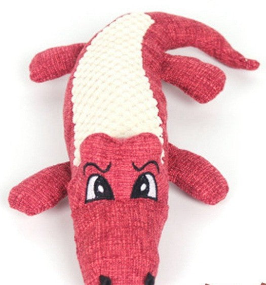 Red Alligator Plush Toy with textured body and expressive eyes.