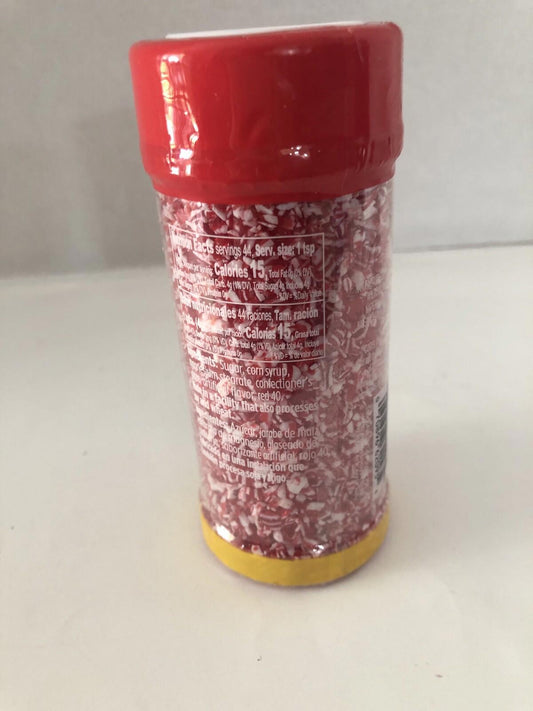 Red Sprinkles container with a yellow base, perfect for decorating desserts.