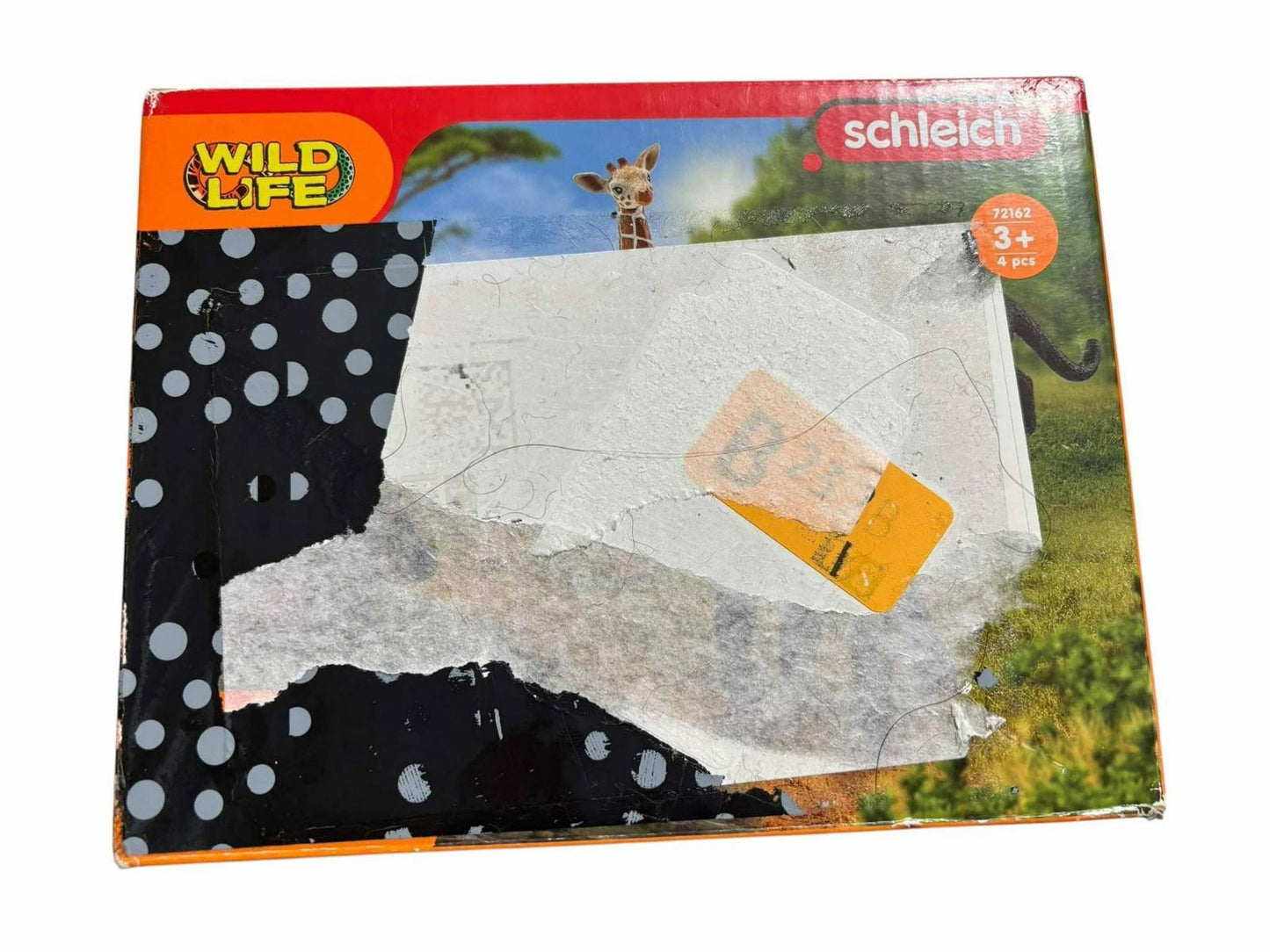 Schleich Wildlife toy box featuring a giraffe design and polka dot pattern.