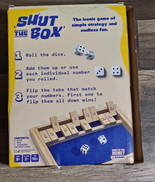 Shut the Box game box featuring dice and game instructions for strategy fun.