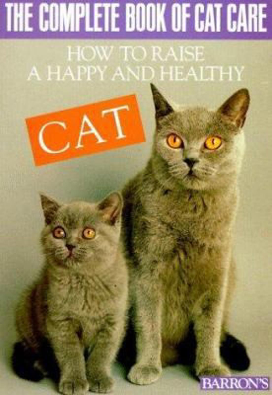 The Complete Book of Cat Care featuring a gray adult cat and a kitten with bright orange eyes.