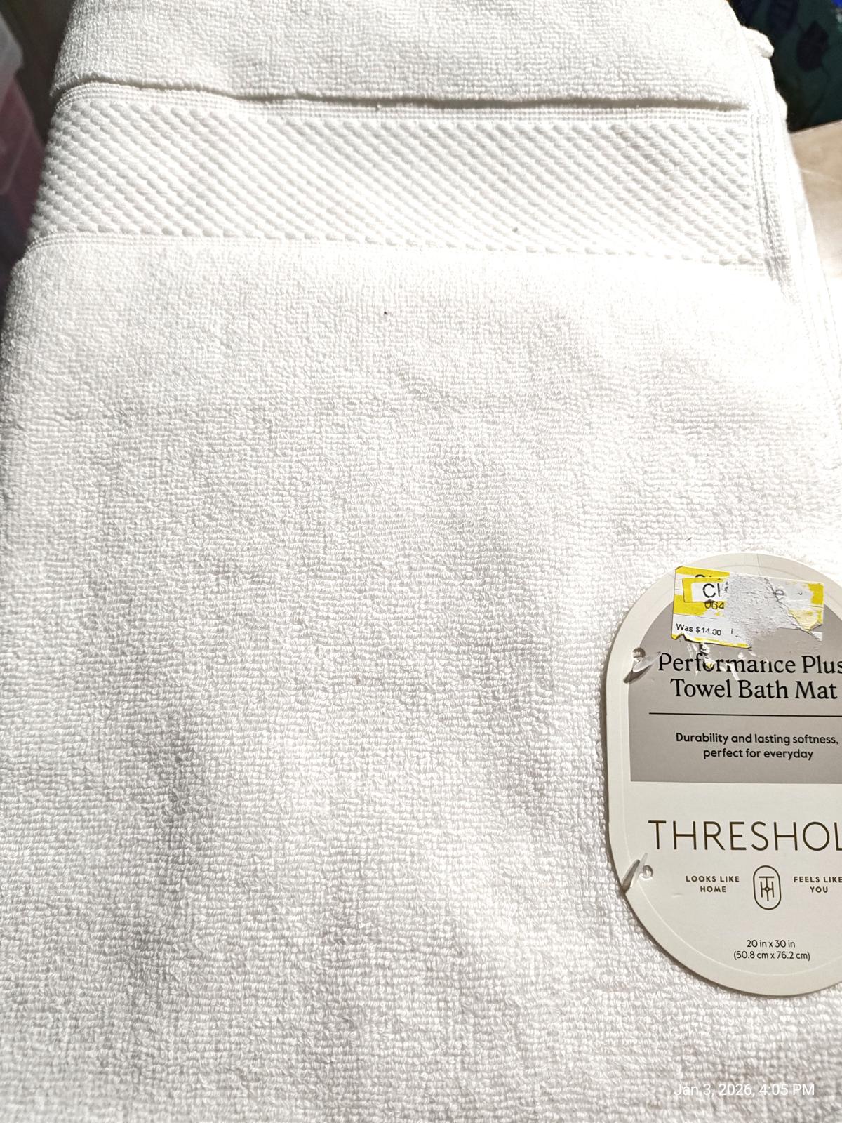 Threshold Performance Plus towel bath mat in white, featuring a textured design.