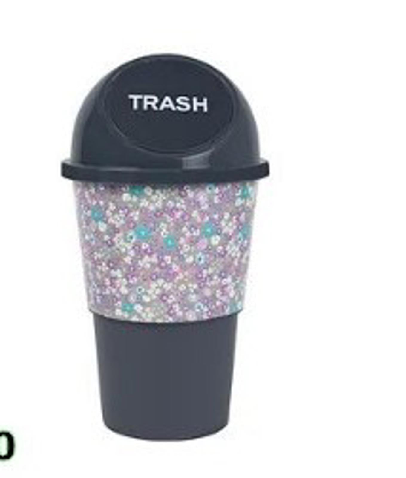 Trash can with floral design and lid, perfect for home or office use.