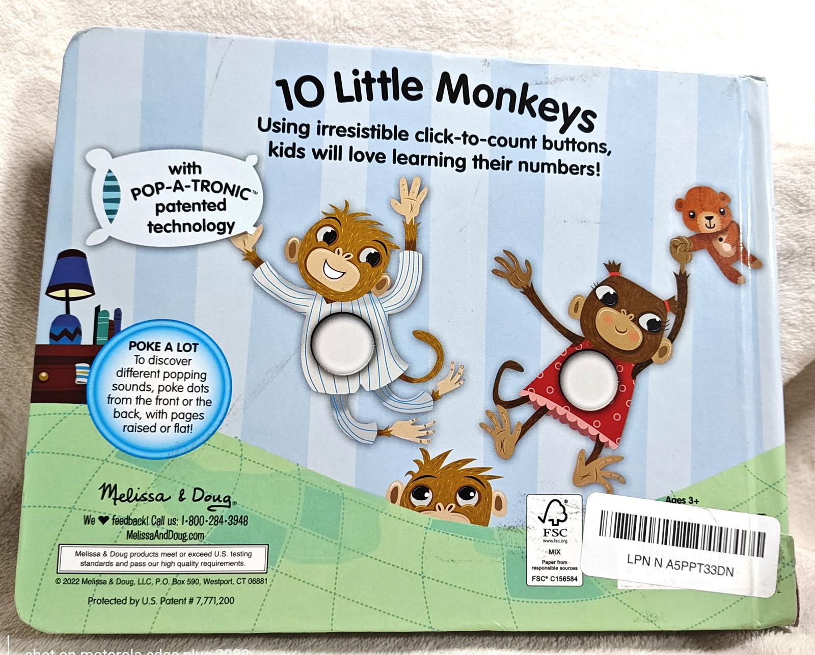 10 Little Monkeys book featuring playful monkeys and interactive buttons for counting.