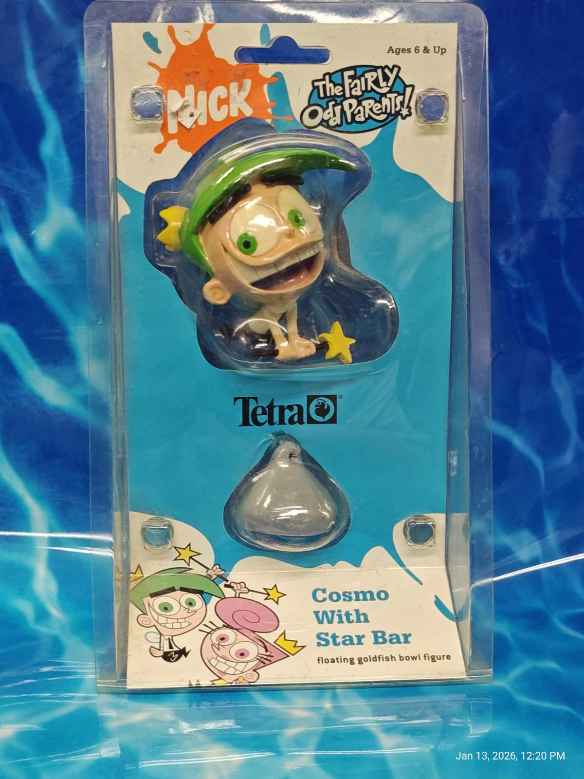 Cosmo with Star Bar action figure from The Fairly OddParents, featuring a green hat and playful expression.