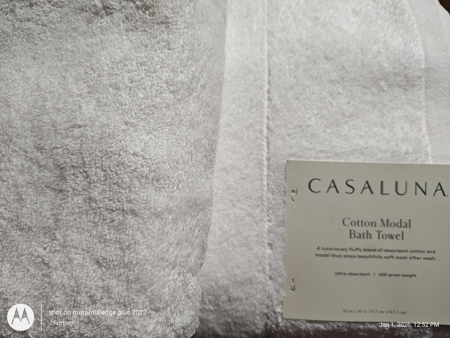 Casaluna cotton modal bath towel in soft white texture, perfect for luxurious drying.
