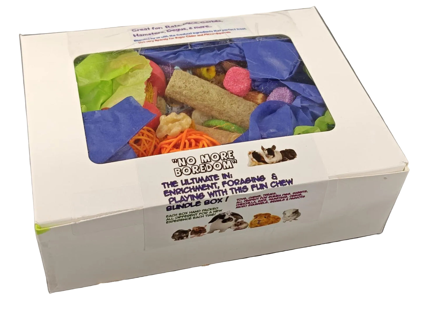 Box of pet chew toys with colorful packaging on a black background