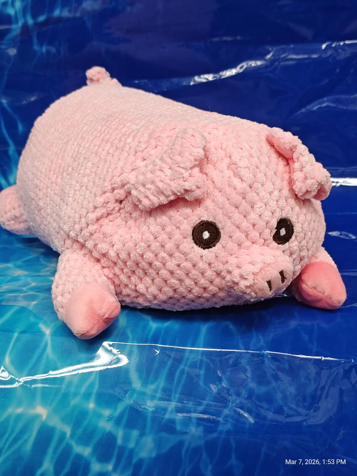 Pink Pig Plush Toy with black eyes and soft texture, perfect for cuddling.