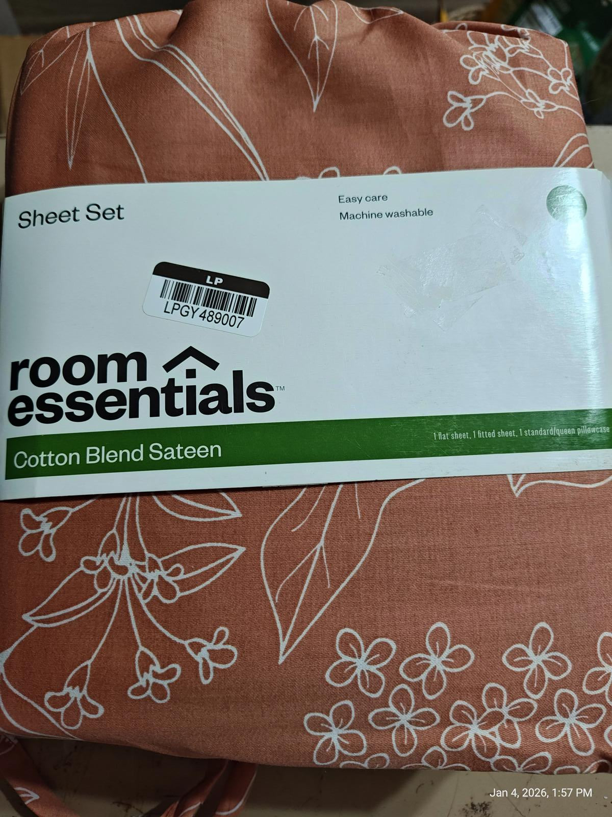 Room Essentials cotton blend sateen sheet set featuring a floral design in a soft peach color.