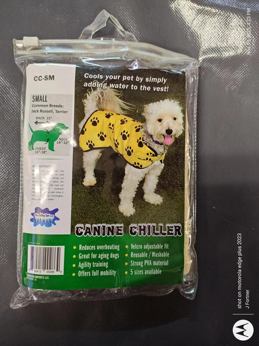 Canine Chiller dog vest in yellow with paw prints, designed for cooling pets during warm weather.