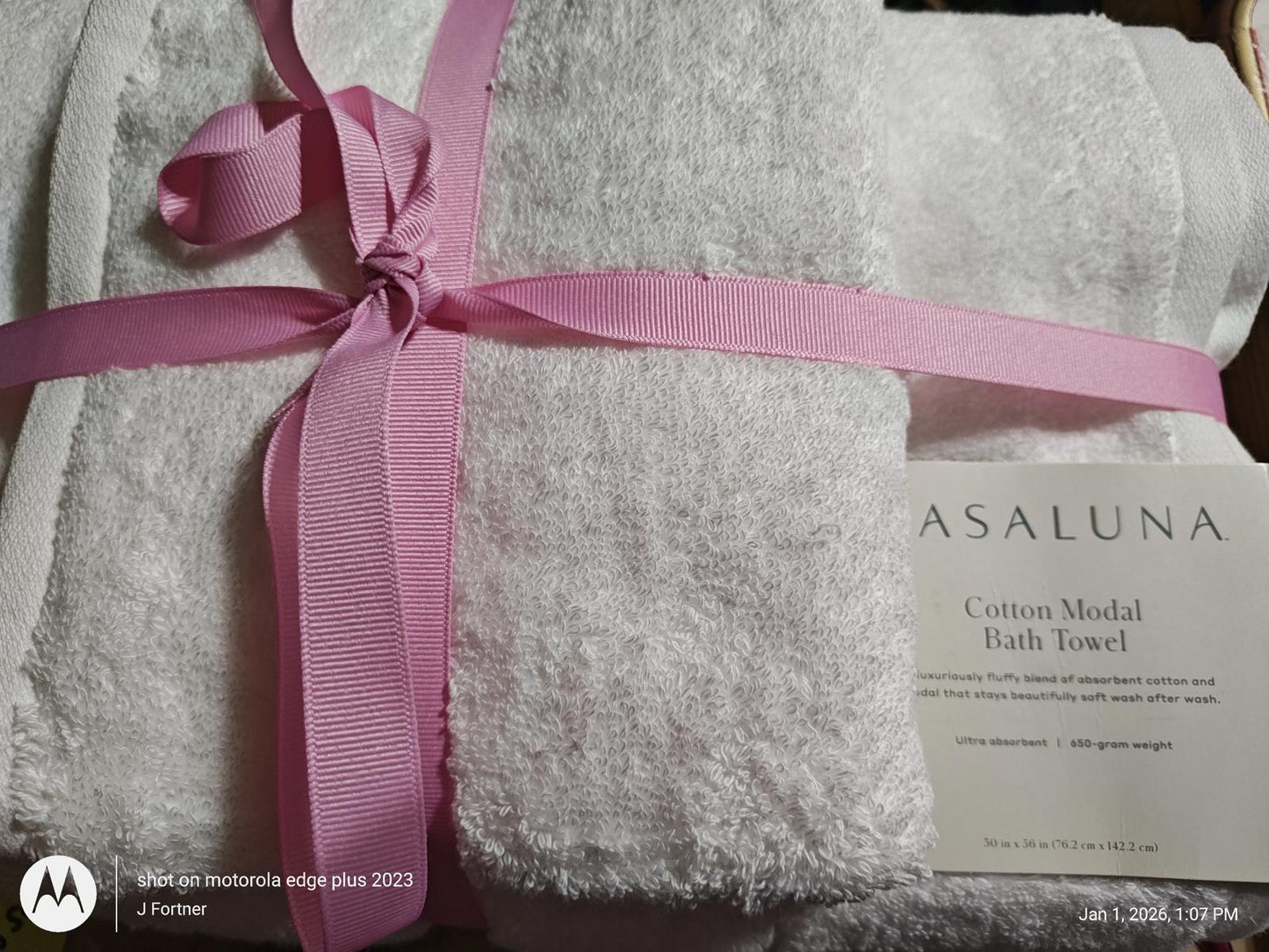 ASALUNA cotton modal bath towel set wrapped with a pink ribbon, featuring soft white towels.