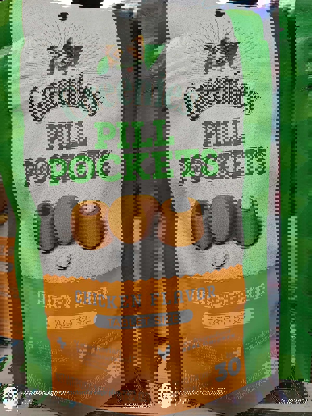 Greenies Pill Pockets chicken flavor tablet size packaging with orange and green design.