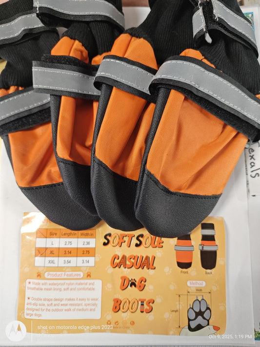 SoftSole casual dog boots in orange and black with adjustable straps for comfort.